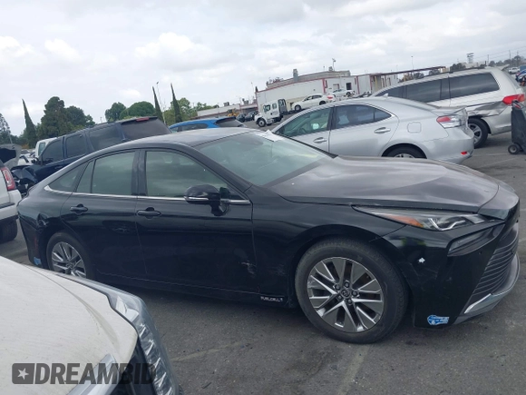 2021 Toyota Mirai XLE with VIN JTDAAAAA1MA002323, listed as a IAAI auction lot 42034157 with 16,592 mi miles and . Bid and sale history available at carsss.com. Image 13.
