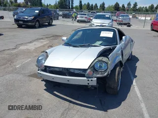 2000 Toyota MR2 z VIN JTDFR3207Y0019297, wystawiony jako IAAI lot #42363059 z przebiegiem 80 260 mil mil oraz . Historia ofert i sprzedaży dostępna na DreamBid. Obrazek 6.