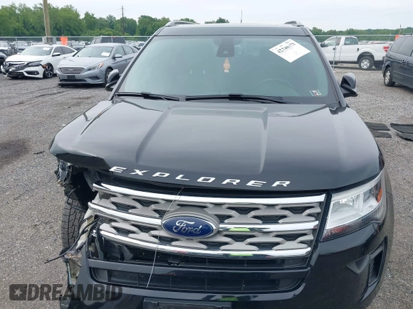 2018 Ford Explorer XLT z VIN 1FM5K8D81JGB94119, wystawiony jako IAAI lot #42346378 z przebiegiem 151 511 mil mil oraz . Historia ofert i sprzedaży dostępna na DreamBid. Obrazek 13.