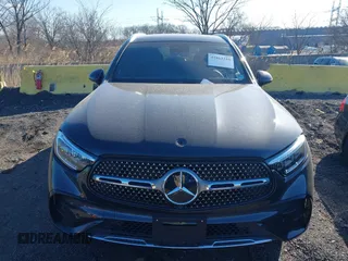 2025 Mercedes-Benz GLC with VIN W1NKM4HB9SF320775, listed as a IAAI auction lot 41863310 with 2,507 mi miles. Bid and sale history available at carsss.com. Image 12.