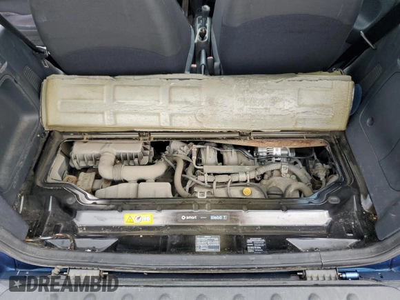 2009 Smart fortwo Pure with VIN WMEEJ31X59K218003, listed as a Copart auction lot 62413775 with 82,711 mi miles and Salvage title. Bid and sale history available at DreamBid. Image 12.