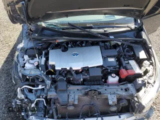 2021 Toyota Prius LE with VIN JTDKAMFP7M3185847, listed as a Copart auction lot 52897465 with 58,996 mi miles and Salvage Title. Bid and sale history available at DreamBid. Image 11.