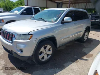 2012 Jeep Grand Cherokee Laredo with VIN 1C4RJEAG4CC167557, listed as a IAAI auction lot 42047720 with 195,631 mi miles. Bid and sale history available at carsss.com. Image 19.