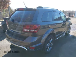 2014 Dodge Journey Crossroad z VIN 3C4PDDGG9ET302345, wystawiony jako IAAI lot #41888259 z przebiegiem 104 980 mil mil oraz . Historia ofert i sprzedaży dostępna na DreamBid. Obrazek 4.