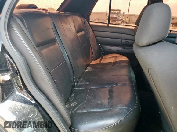 2010 Ford Police Interceptor with VIN 2FABP7BV9AX110091, listed as a Copart auction lot 60065205 with Not provided miles and Salvage title. Bid and sale history available at DreamBid. Image 10.