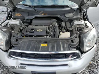 2016 MINI Countryman S with VIN WMWZC3C58GWT08173, listed as a Copart auction lot 44627235 with 76,814 mi miles and Salvage title. Bid and sale history available at DreamBid. Image 13.