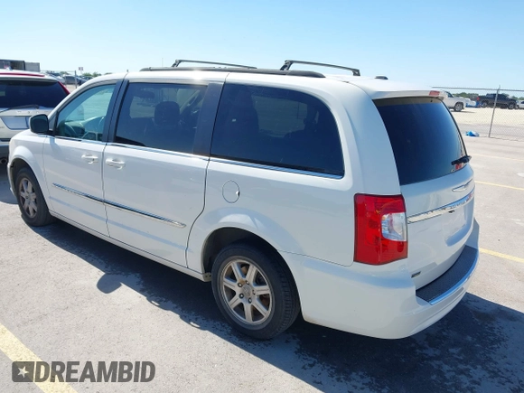 2012 Chrysler Town & Country Touring with VIN 2C4RC1BG7CR308985, listed as a IAAI auction lot 42015578 with 196,604 mi miles. Bid and sale history available at carsss.com. Image 3.