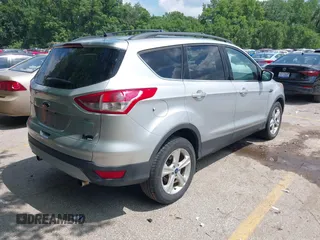 2013 Ford Escape SE z VIN 1FMCU0GXXDUC92917, wystawiony jako IAAI lot #42458117 z przebiegiem 136 006 mil mil oraz . Historia ofert i sprzedaży dostępna na DreamBid. Obrazek 4.