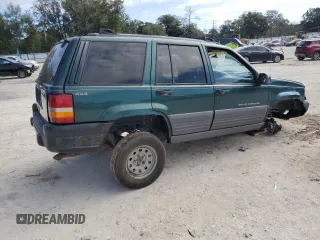 1996 Jeep Grand Cherokee Laredo with VIN 1J4GZ58S1TC340018, listed as a Copart auction lot 86571454 with 0 mi miles and Salvage Title. Bid and sale history available at carsss.com. Image 3.
