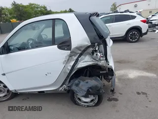 2013 Smart fortwo Pure with VIN WMEEJ3BA5DK625404, listed as a IAAI auction lot 42368884 with Not provided miles and . Bid and sale history available at DreamBid. Image 6.