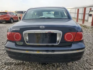 2005 Kia Amanti z VIN KNALD124055055725, wystawiony jako Copart lot #73573754 z przebiegiem 105 665 mil mil oraz Tytuł czysty. Historia ofert i sprzedaży dostępna na DreamBid. Obrazek 6.