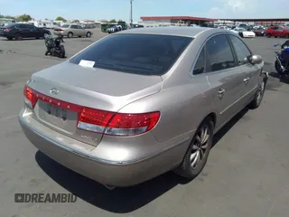 2006 Hyundai Azera SE z VIN KMHFC46F06A121839, wystawiony jako IAAI lot #37194434 z przebiegiem 169 698 mil mil oraz . Historia ofert i sprzedaży dostępna na DreamBid. Obrazek 4.