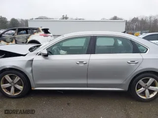 2012 Volkswagen Passat SE w/Sunroof with VIN 1VWBP7A35CC081714, listed as a IAAI auction lot 41864409 with 152,603 mi miles. Bid and sale history available at carsss.com. Image 14.