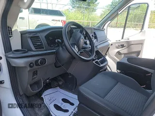 2023 Ford Transit Cargo с VIN 1FTBR1X81PKB13549, выставлен на аукционе IAAI как лот 42556081 с пробегом 68 225 миль миль и . История ставок и продаж доступна на DreamBid. Изображение 9.