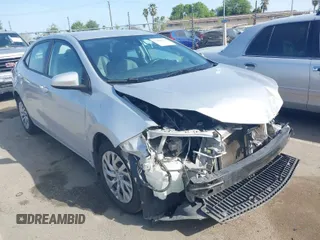 2019 Toyota Corolla L with VIN 2T1BURHE2KC190975, listed as a IAAI auction lot 41901370 with 94,925 mi miles. Bid and sale history available at carsss.com. Image 1.