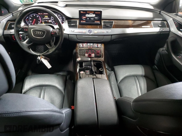 2015 Audi A8 z VIN WAUJGAFDXFN008499, wystawiony jako Copart lot #87658385 z przebiegiem 103 175 mil mil oraz Szkoda całkowita • Salvage title. Historia ofert i sprzedaży dostępna na DreamBid. Obrazek 8.