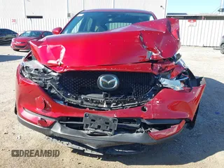 2020 Mazda CX-5 Touring with VIN JM3KFACM1L0756864, listed as a IAAI auction lot 41761131 with 16,646 mi miles and . Bid and sale history available at carsss.com. Image 12.