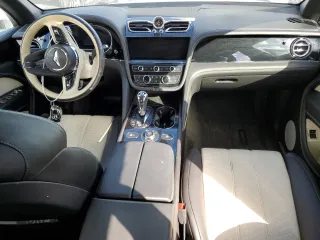 2021 Bentley Bentayga V8 z VIN SJAAM2ZV4MC034001, wystawiony jako Copart lot #78093424 z przebiegiem Nie podano mil oraz Szkoda całkowita • Salvage title. Historia ofert i sprzedaży dostępna na DreamBid. Obrazek 8.