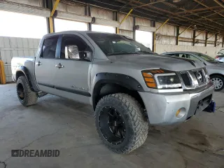 2006 Nissan Titan LE with VIN 1N6BA07A16N573521, listed as a Copart auction lot 51449665 with 158,613 mi miles and Clean Title. Bid and sale history available at DreamBid. Image 4.