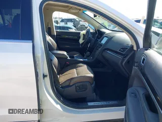 2016 Lincoln MKT EcoBoost z VIN 2LMHJ5AT0GBL00877, wystawiony jako IAAI lot #41722584 z przebiegiem 148 585 mil mil oraz . Historia ofert i sprzedaży dostępna na DreamBid. Obrazek 5.