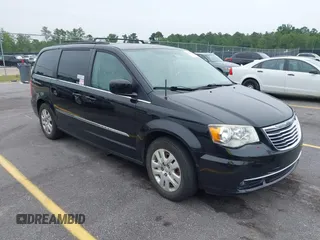 2013 Chrysler Town & Country Touring z VIN 2C4RC1BG1DR691792, wystawiony jako IAAI lot #42409133 z przebiegiem 167 048 mil mil oraz . Historia ofert i sprzedaży dostępna na DreamBid. Obrazek 1.