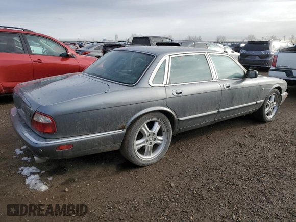 2002 Jaguar XJ with VIN SAJFA12C72LF47096, listed as a Copart auction lot 79412794 with 287,060 mi miles and Clean Title. Bid and sale history available at DreamBid. Image 3.