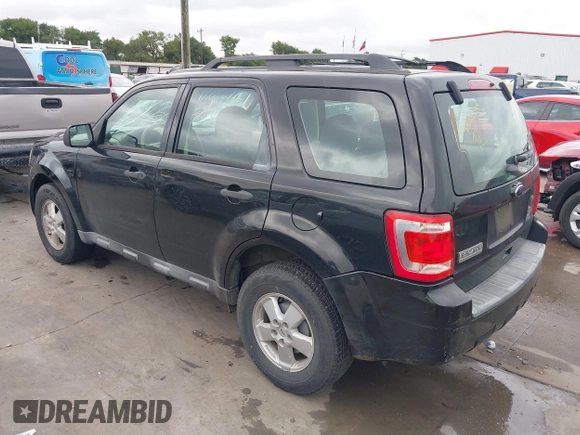 2011 Ford Escape XLS z VIN 1FMCU0C73BKB97601, wystawiony jako IAAI lot #42498599 z przebiegiem 243 282 mil mil oraz . Historia ofert i sprzedaży dostępna na DreamBid. Obrazek 3.