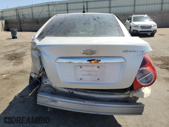 2014 Chevrolet Sonic LT with VIN 1G1JC5SH0E4148279, listed as a Copart auction lot 52308785 with 96,175 mi miles and Salvage Title. Bid and sale history available at DreamBid. Image 6.