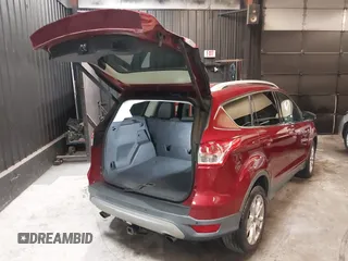 2014 Ford Escape Titanium with VIN 1FMCU9J9XEUD69589, listed as a IAAI auction lot 42031882 with 123,632 mi miles and . Bid and sale history available at DreamBid. Image 4.