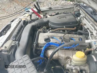 2000 Nissan Frontier XE with VIN 1N6DD26S9YC428165, listed as a IAAI auction lot 42966998 with 145,062 mi miles and . Bid and sale history available at DreamBid. Image 13.