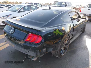 2021 Ford Mustang EcoBoost with VIN 1FA6P8TD7M5149328, listed as a IAAI auction lot 41323190 with 1 mi miles. Bid and sale history available at carsss.com. Image 4.