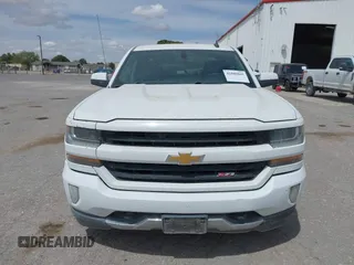 2018 Chevrolet Silverado 1500 LT with VIN 1GCUKREC5JF133998, listed as a IAAI auction lot 41880805 with 166,258 mi miles and . Bid and sale history available at DreamBid. Image 12.