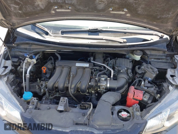 2015 Honda Fit LX with VIN 3HGGK5G54FM731965, listed as a IAAI auction lot 42655355 with 141,205 mi miles and . Bid and sale history available at DreamBid. Image 10.