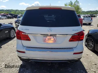 2013 Mercedes-Benz GL 450 z VIN 4JGDF7CE4DA166257, wystawiony jako Copart lot #58972195 z przebiegiem Nie podano mil oraz Czysty tytuł • Clean title. Historia ofert i sprzedaży dostępna na DreamBid. Obrazek 6.