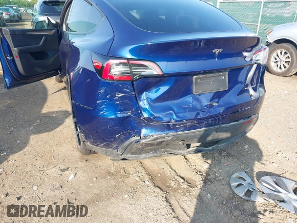 2023 Tesla Model Y Long Range with VIN 7SAYGDEE0PF671726, listed as a IAAI auction lot 42393616 with Not provided miles and . Bid and sale history available at DreamBid. Image 19.