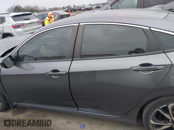 2019 Honda Civic Si z VIN 2HGFC1E52KH701117, wystawiony jako IAAI lot #41722505 z przebiegiem 64 085 mil mil oraz . Historia ofert i sprzedaży dostępna na DreamBid. Obrazek 14.