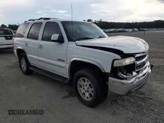 2001 Chevrolet Tahoe LT z VIN 1GNEK13TX1R176358, wystawiony jako Copart lot #56389115 z przebiegiem 241 898 mil mil oraz Szkoda całkowita • Salvage title. Historia ofert i sprzedaży dostępna na DreamBid. Obrazek 4.