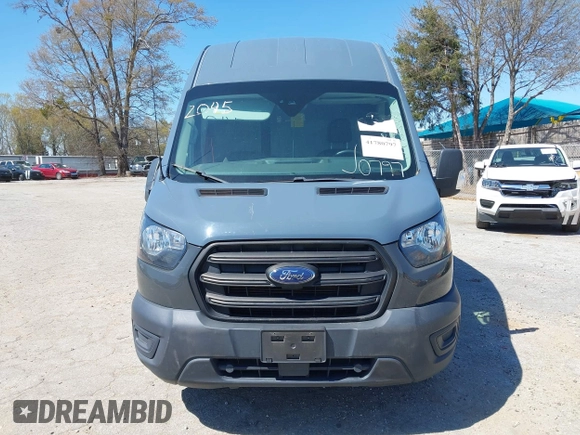 2020 Ford Transit Cargo with VIN 1FTBR3X87LKA48065, listed as a IAAI auction lot 41780797 with 82,385 mi miles. Bid and sale history available at carsss.com. Image 12.