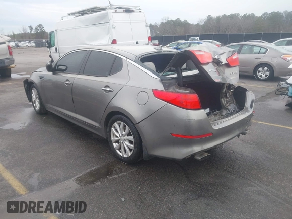 2014 Kia Optima EX z VIN 5XXGN4A75EG290132, wystawiony jako IAAI lot #41292706 z przebiegiem 155 793 mil mil oraz . Historia ofert i sprzedaży dostępna na DreamBid. Obrazek 3.