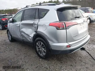 2016 Toyota RAV4 Hybrid XLE with VIN JTMRJREV3GD029654, listed as a IAAI auction lot 41144893 with 73,163 mi miles. Bid and sale history available at carsss.com. Image 3.