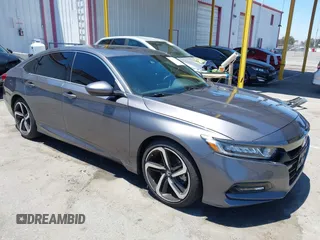 2018 Honda Accord Sport z VIN 1HGCV2F33JA023149, wystawiony jako IAAI lot #42662389 z przebiegiem 108 843 mil mil oraz . Historia ofert i sprzedaży dostępna na DreamBid. Obrazek 1.