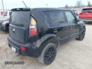 2010 Kia Soul + with VIN KNDJT2A28A7125814, listed as a IAAI auction lot 41808123 with 171,124 mi miles. Bid and sale history available at carsss.com. Image 4.