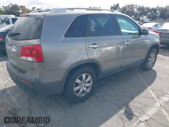 2011 Kia Sorento LX with VIN 5XYKTDA10BG061974, listed as a IAAI auction lot 41924081 with 148,856 mi miles. Bid and sale history available at carsss.com. Image 4.