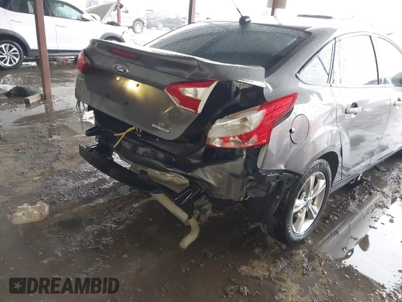 2013 Ford Focus SE with VIN 1FADP3F29DL243937, listed as a IAAI auction lot 42145911 with 90,376 mi miles and . Bid and sale history available at DreamBid. Image 6.