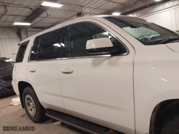 2015 Chevrolet Tahoe Commercial with VIN 1GNSK2EC5FR688820, listed as a IAAI auction lot 41444813 with 206,244 mi miles. Bid and sale history available at carsss.com. Image 14.