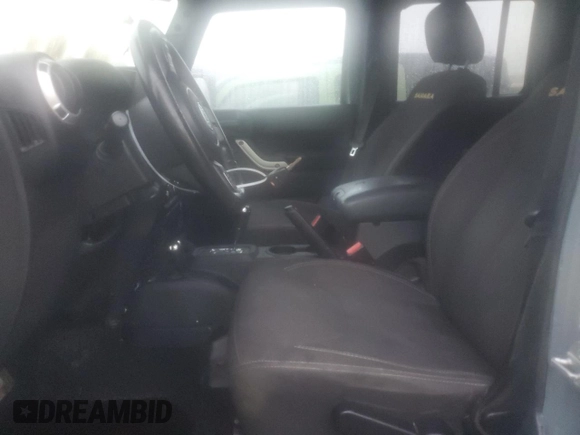 2015 Jeep Wrangler Unlimited Altitude with VIN 1C4BJWEG2FL526510, listed as a Copart auction lot 80788854 with Not provided miles and Salvage title. Bid and sale history available at DreamBid. Image 7.