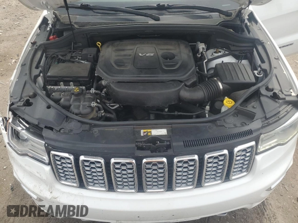2018 Jeep Grand Cherokee Overland with VIN 1C4RJFCG5JC437508, listed as a Copart auction lot 51814795 with 104,598 mi miles and Salvage title. Bid and sale history available at DreamBid. Image 12.