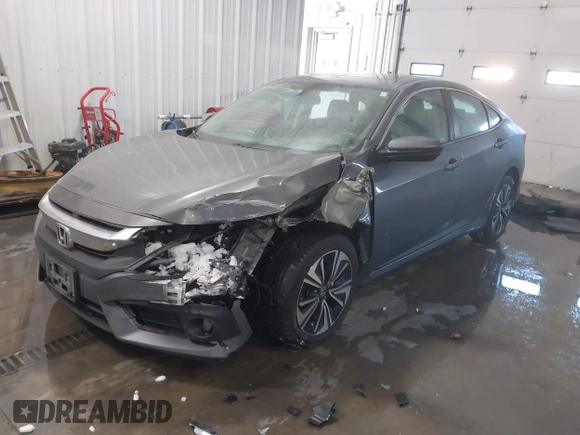 2018 Honda Civic EX-T with VIN JHMFC1F35JX031132, listed as a IAAI auction lot 41591028 with 111,087 mi miles and . Bid and sale history available at DreamBid. Image 2.