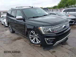 2019 Ford Expedition Platinum with VIN 1FMJU1MT8KEA02325, listed as a IAAI auction lot 41861772 with 77,124 mi miles. Bid and sale history available at carsss.com. Image 1.
