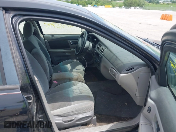 2003 Ford Taurus SE Standard with VIN 1FAFP53U13A102879, listed as a IAAI auction lot 42335795 with 193,023 mi miles and . Bid and sale history available at DreamBid. Image 5.